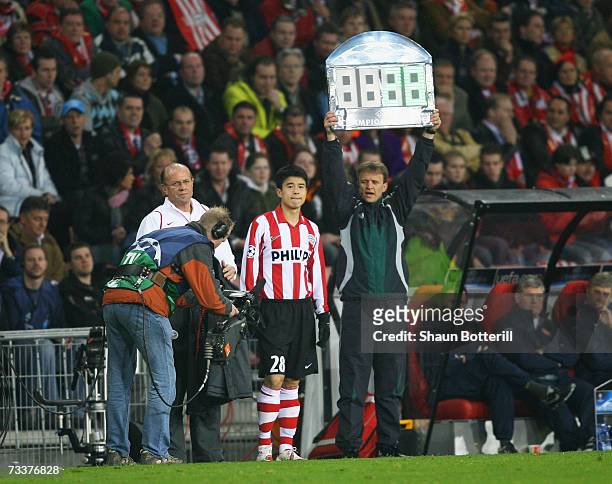 Xiang Sun of PSV Eindhoven makes his Champions League debut during the UEFA Champions League Round of 16, first leg between PSV Eindhoven and Arsenal...