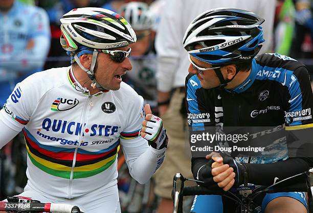 Paolo Bettini of Itay riding for Quick Step-Innergetic, talks with Ivan Basso of Itay riding for Discovery Channel Pro Cycling Team, before Stage 2...