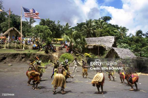 Vanuatu-US-cult-religion,sched-FEATURE This photo taken 15 February, 2006 shows dancers celebrating the anniversary of the John Frum Movement cargo...