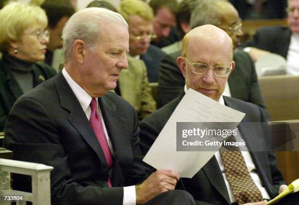 Former Secretary of State and Bush Campaign Advisor James Baker, left, talks with attorney Ben Ginsberg prior to the oral arguments at Florida State...