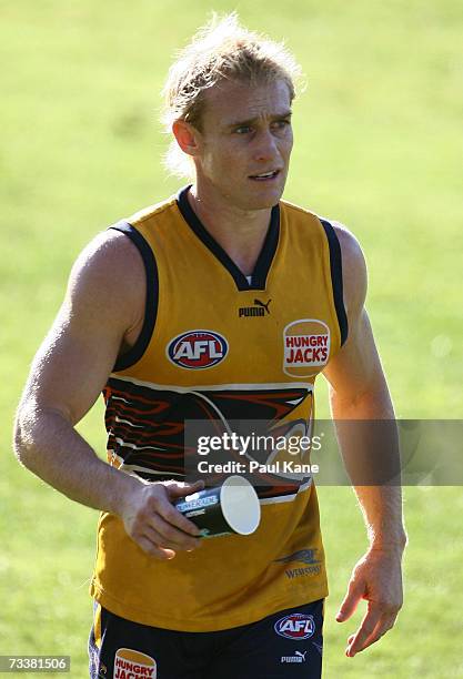 Michael Braun heads for the drink station during the West Coast Eagles AFL training session at Subiaco Oval February 21, 2007 in Perth, Australia.