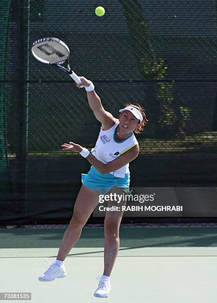 Dubai, UNITED ARAB EMIRATES: Ai Sugiyama of Japan returns the ball to her opponent Eleni Daniilidou of Greece during their tennis match for the Dubai...