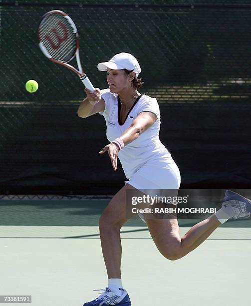 Dubai, UNITED ARAB EMIRATES: Eleni Daniilidou of Greece returns the ball to her opponent Ai Sugiyama of Japan during their tennis match for the Dubai...