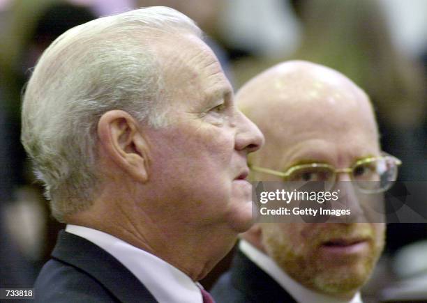 Former Secretary of State and Bush Campaign Advisor James Baker, left, sits with attorney Ben Ginsberg during a hearing at the Florida State Supreme...