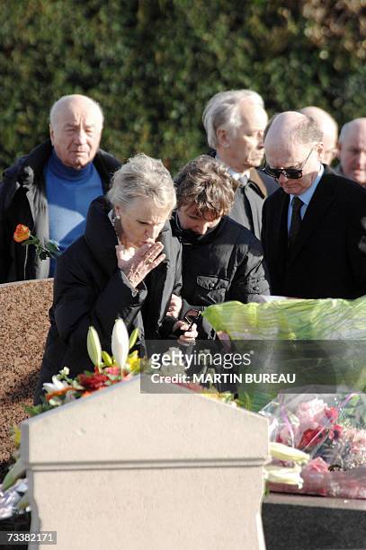 Gretz-Armainvilliers, FRANCE: Aline the second daughter of Maurice Papon, sends a kiss to his father as she attends with relatives the funeral of...