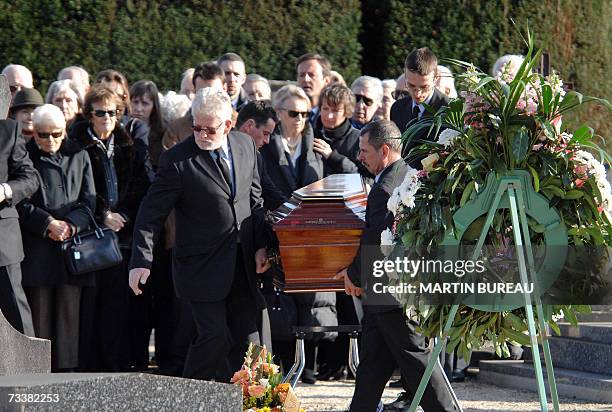 Gretz-Armainvilliers, FRANCE: The coffin of Maurice Papon is carried as relatives attend the funeral of the French Nazi collaborator in the town of...