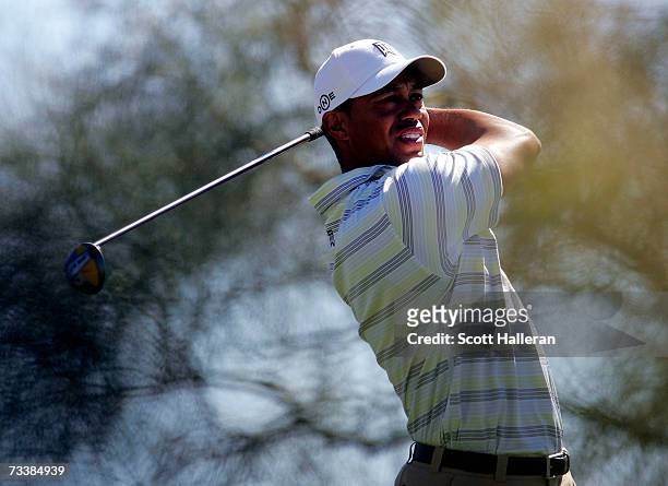 Tiger Woods hits his tee shot on the second hole during the first round of the WGC-Accenture Match Play Championships at The Gallery at Dove Mountain...