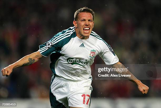 Craig Bellamy of Liverpool celebrates after scoring his goal during the UEFA Champions League round of 16 first leg match between Barcelona and...