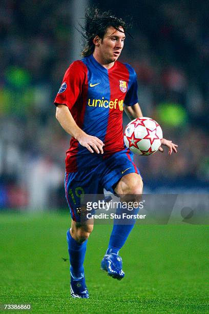 Barcelona winger Lionel Messi moves the ball during a UEFA Champions League round of 16 first leg match against Liverpool at the Camp Nou Stadium on...