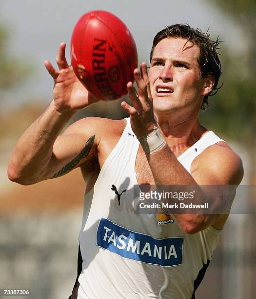 Trent Croad of the Hawks marks on the lead during the Hawthorn Hawks AFL training session at Waverley Park on February 22, 2007 in Melbourne,...