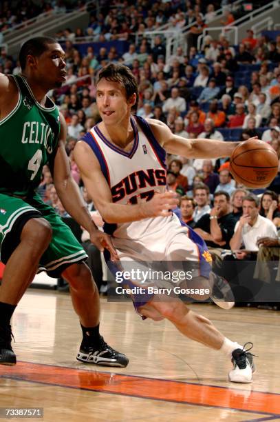 Steve Nash of the Phoenix Suns drives against Ryan Gomes of the Boston Celtics in an NBA game played on February 21, 2007 at U.S. Airways Center in...