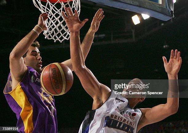 Dusty Rychart of the Bullets Strips the ball off Ian Crosswhite of the Kings during game two of the NBL semi final series between the Sydney Kings...