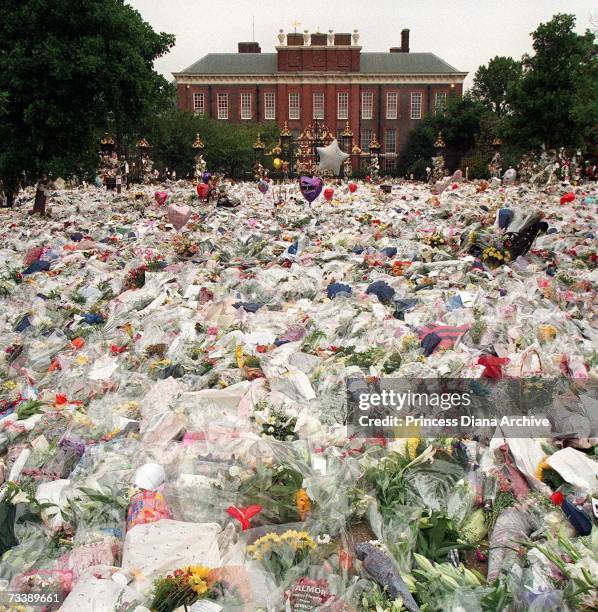 Floral tributes and balloons laid in the gardens of Kensington Palace after the death of Princess Diana, Princess of Wales, 31st August 1997.