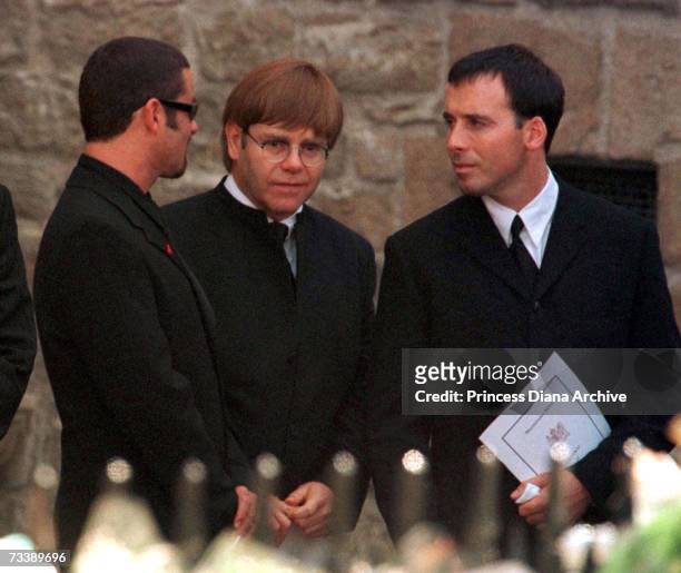 Singers Elton John and George Michael leaving Westminster Abbey after the funeral service for Princess Diana, Princess of Wales, 6th September 1997....
