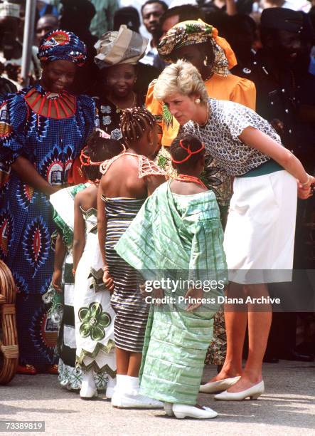 The Princess of Wales attends the Rural Women's Fair in Tafawa Balewa Square, Lagos, with Maryam Babangida , the wife of the Nigerian president,...