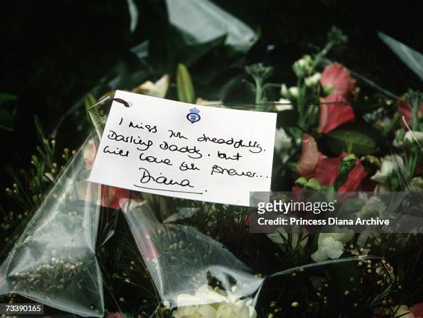 Bouquet of flowers and message card laid by the Princess of Wales at the funeral of her father, the 8th Earl Spencer at Great Brington, Northampton,...