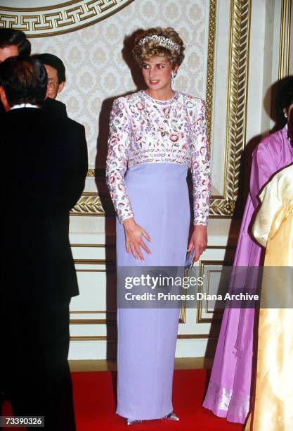 The Princess of Wales attending a banquet thrown by President Roh in Seoul, South Korea, November 1992. Diana wears the Spencer family tiara and a...