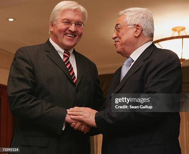 Palestinian President Mahmoud Abbas and German Foreign Minister Frank-Walter Steinmeier shake hands after speaking to the media, after talks at the...
