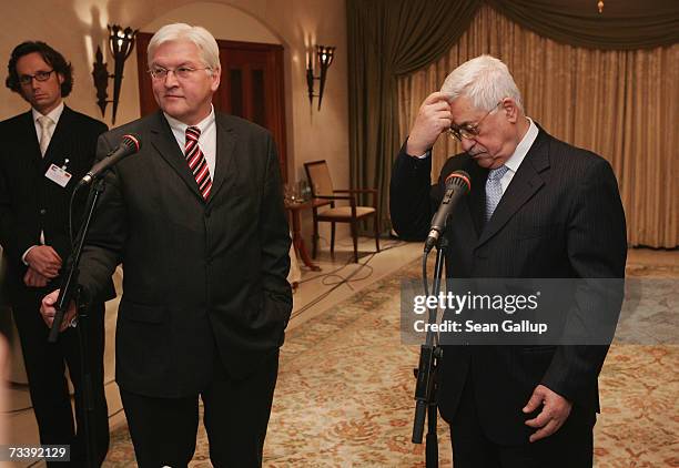 Palestinian President Mahmoud Abbas and German Foreign Minister Frank-Walter Steinmeier speak to the media after talks at the Adlon Hotel February...