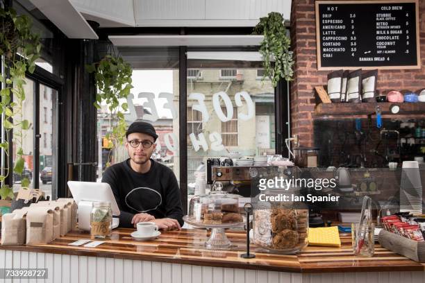 male employee in cafe, new york, usa - brooklyn heights stock pictures, royalty-free photos & images