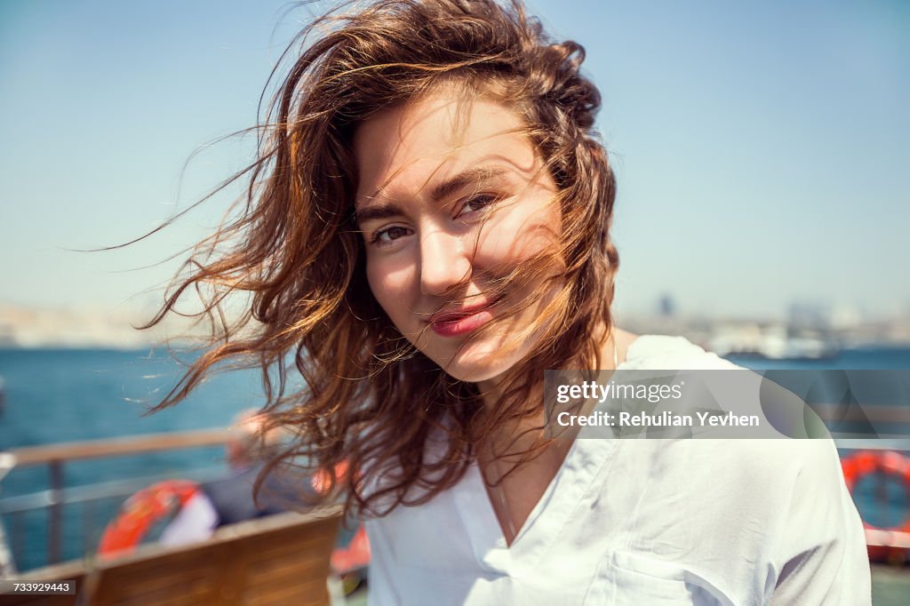 Portrait of young female tourist on passenger ferry deck, Beyazit, Turkey