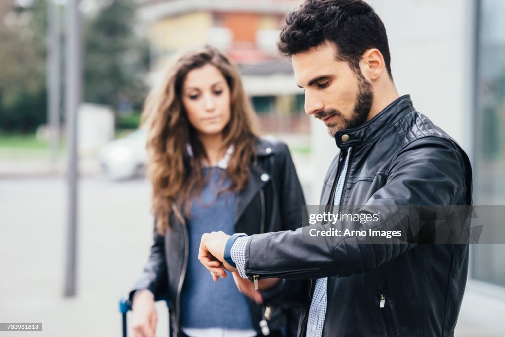 Man checking time, Florence, Italy