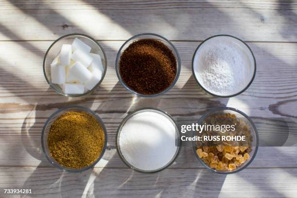 glasses of sugar in various forms, overhead view - sugar ストックフォトと画像