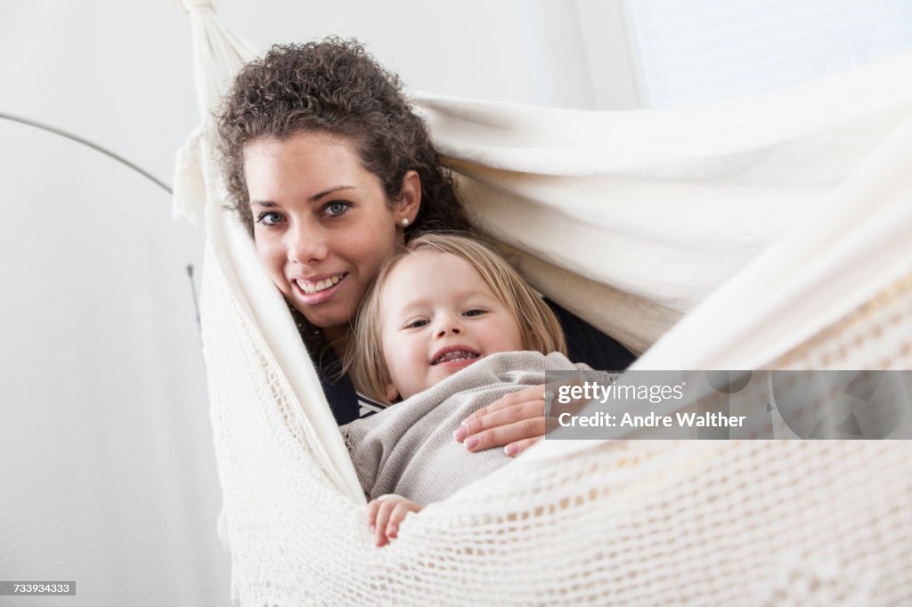 Mother and daughter in hammock