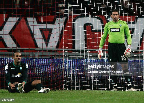 Naldo and goalkeeper Timm Wiese of Bremen after Ajax scored the second goal during the UEFA Cup round of 32 second leg match between Ajax Amsterdam...