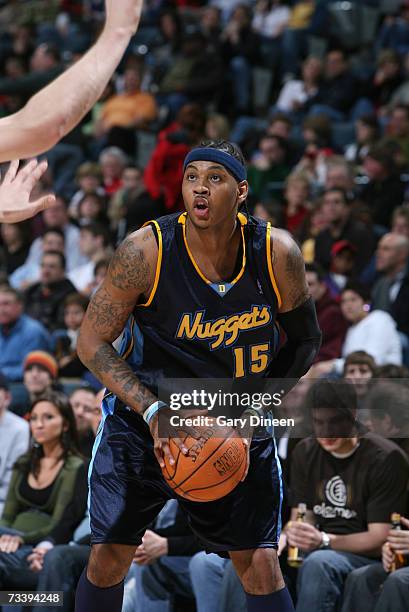 Carmelo Anthony of the Denver Nuggets looks to shoot during a game against the Milwaukee Bucks at the Bradley Center on February 10, 2007 in...