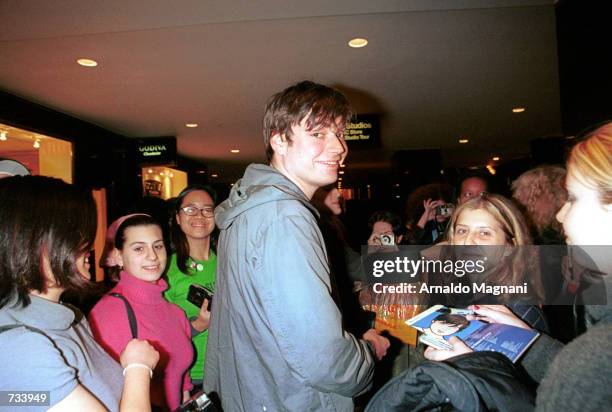 Blur band member, Alex James, is greeted by fans as he leaves the Conan O''Brien Show November 10, 2000 in New York City. Blur's new album, called...