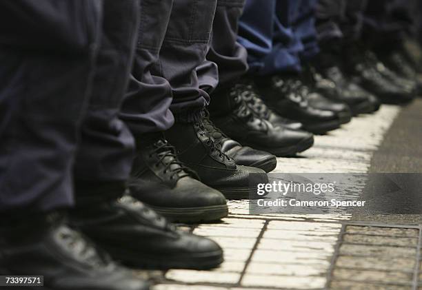 Police form a blockade during a demonstration outside the Shangri La Hotel in the Rocks February 23, 2007 in Sydney, Australia. Several hundred...