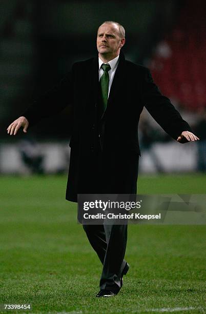 Head coach Thomas Schaaf of Bremen celebrates the qualifying for the next round after the UEFA Cup round of 32 second leg match between Ajax...