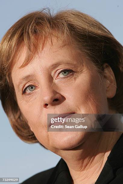 German Chancellor Angela Merkel speaks to the media after talks with Palestinian President Mahmoud Abbas on February 23, 2007 in Berlin, Germany....