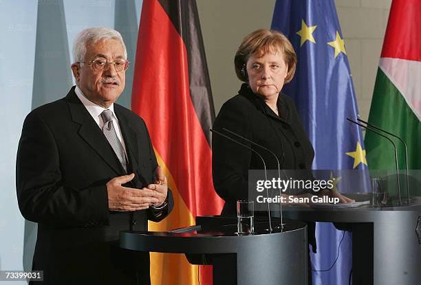 Palestinian President Mahmoud Abbas and German Chancellor Angela Merkel speak to the media after talks on February 23, 2007 in Berlin, Germany....