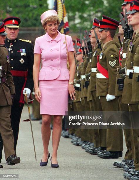 Princess Diana inspecting members of the Queen's and Royal Hampshire Regiment during a visit to Howe Barracks, Canterbury, Kent, May 1995. She is...