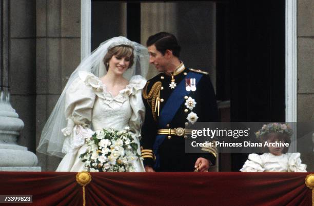 The Prince and Princess of Wales pose on the balcony of Buckingham Palace on their wedding day, 29th July 1981.