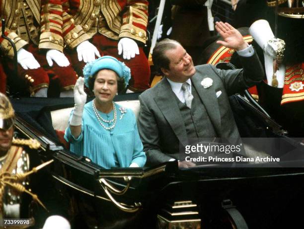 The Queen and Earl Spencer travel from St Paul's Cathedral by carriage after the wedding of their respective son and daughter, now the Prince and...