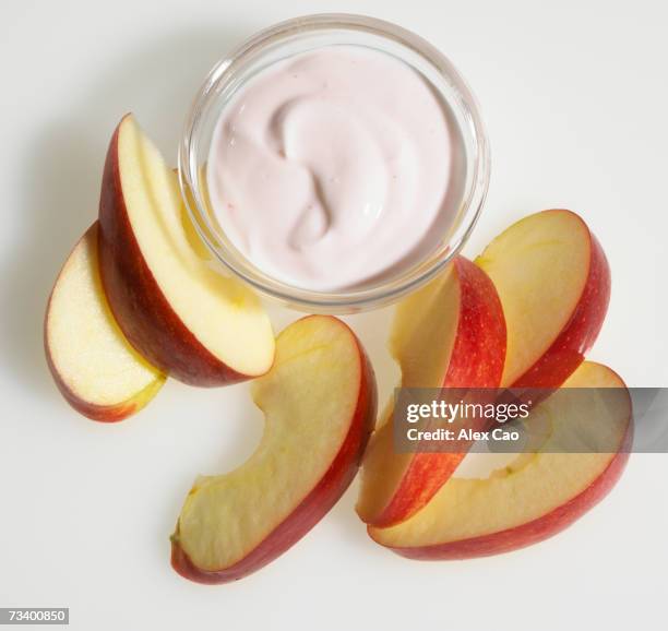 apple slices with pot of yoghurt - yoghurt pot stock pictures, royalty-free photos & images