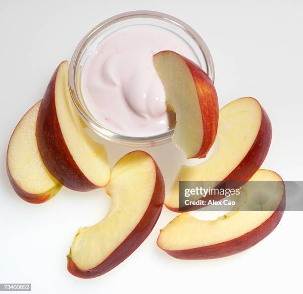 apple slices with pot of yoghurt - yoghurt pot stock pictures, royalty-free photos & images