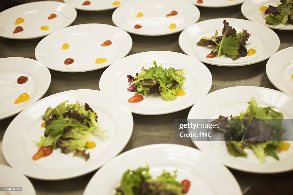 Salads plates on table, close-up