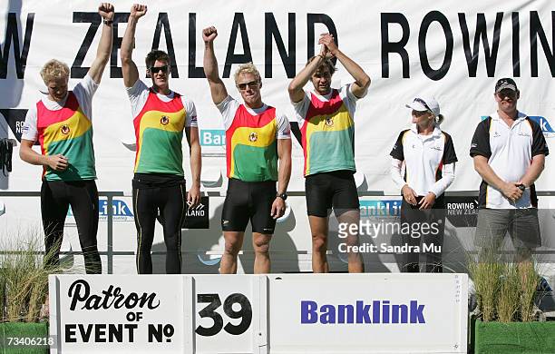 Dane Boswell, Paul Gerritsen, Selwyn Cleland, Eric Murray and cox Rachel Goudie celebrate on the podium with their trophies after winning the Mens...