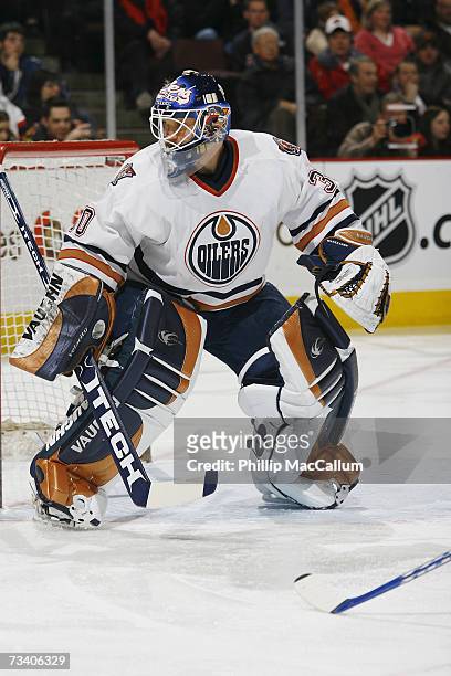 Jussi Markkanen of the Edmonton Oilers eyes the play against the Ottawa Senators on February 20, 2007 at Scotiabank Place in Ottawa, Ontario, Canada....