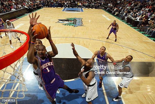 Amare Stoudemire of the Phoenix Suns drives to the basket against Mark Blount of the Minnesota Timberwolves on February 23, 2007 at the Target Center...