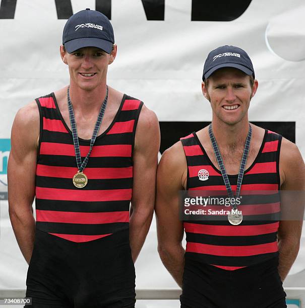 Peter Taylor and Richard Beaumont of Auckland with their gold medals on the podium for the Mens Lightweight Double Sculls Final during the New...