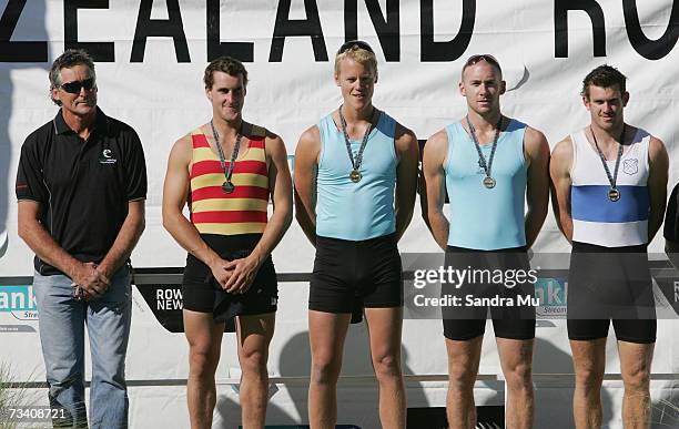 Matthew Adam, Mikkel Nielsen, Joseph Sullivan and Scott Vandenbosch of Central stand on the podium after taking gold in the Mens Under 21 Quad Final...