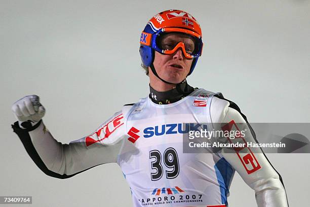 Roar Ljoekelsoey of Norway celebrates during the Large Hill Jumping Event during the FIS Nordic World Ski Championships 2007 on February 24, 2007 in...