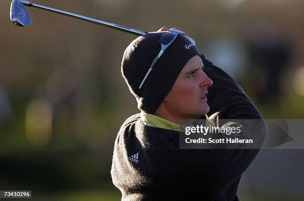 Justin Rose of England hits a shot on the practice ground during the fourth round of the WGC-Accenture Match Play Championships on February 24, 2007...