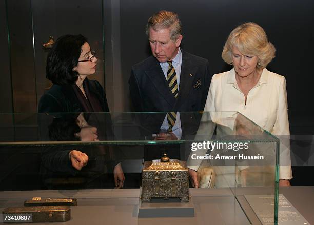 Prince Charles, Prince of Wales and Camilla, Duchess of Cornwall look at exhibits of Islamic art at a museum on February 24, 2007 in Doha, Qatar.