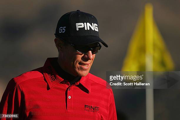Nick O'Hern of Australia walks off the first green during the fourth round of the WGC-Accenture Match Play Championships on February 24, 2007 at The...